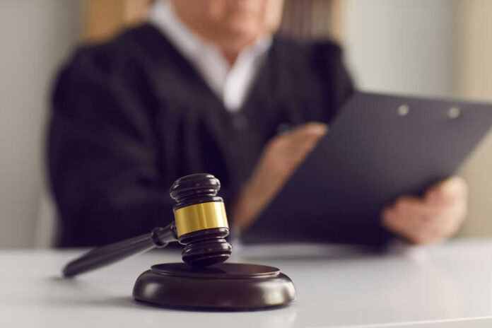 Close,Up,Of,A,Dark,Brown,Judge's,Gavel,On,The