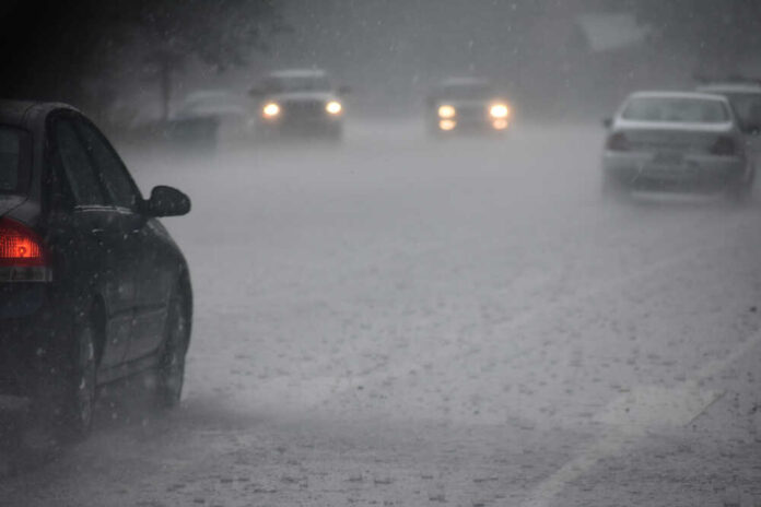 Cars,Driving,During,Middle,Of,June,Hail,Storm,In,Northern