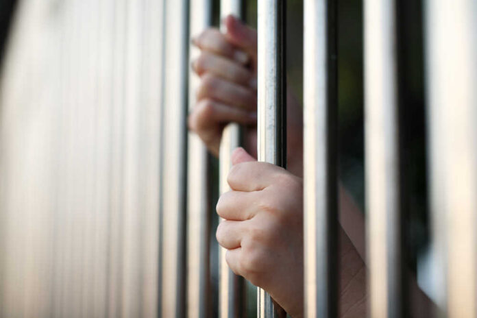 Hand,In,Jail.