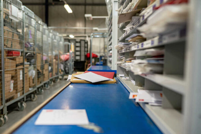 Postal,Service,,Post,Office,Inside.,Letters,On,A,Sorting,Frame,