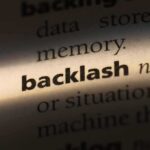 Close-up of text highlighting the word "backlash".