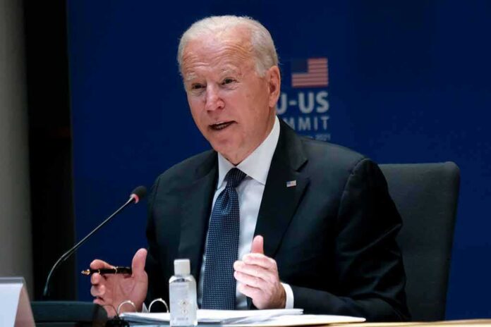 2037559475 featured image Man speaking at EU-US summit conference.