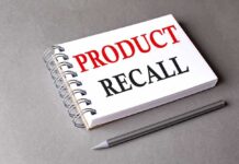 Notebook with "Product Recall" text and pencil.