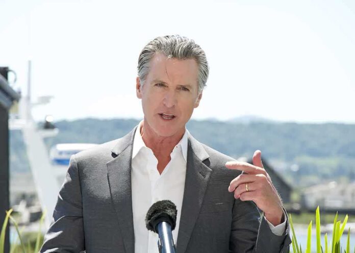 2454042567 featured image Man speaking with microphone outdoors.