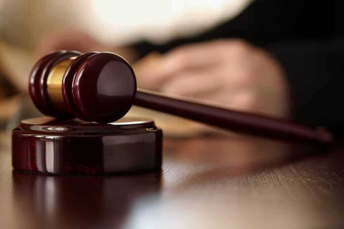 50492266 featured image Wooden gavel resting on a judge's desk.