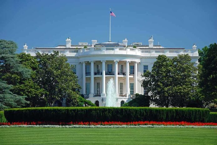 52798168 featured image White House with American flag and fountain visible