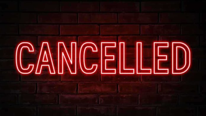 1832010223 featured image Red neon cancelled sign on brick wall background