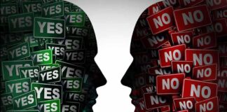 Silhouettes filled with "YES" and "NO" signs facing each other.