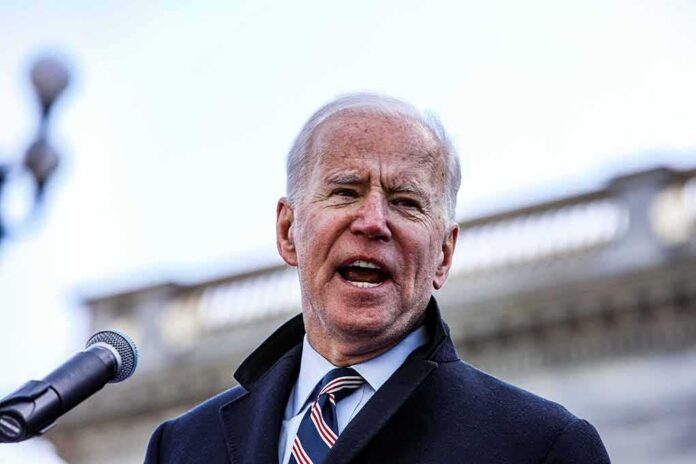 1634412691 featured image Man speaking at an outdoor event with microphone.