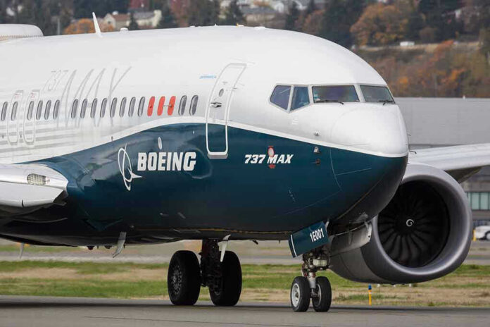 1854534454 Boeing 737 MAX airplane on runway