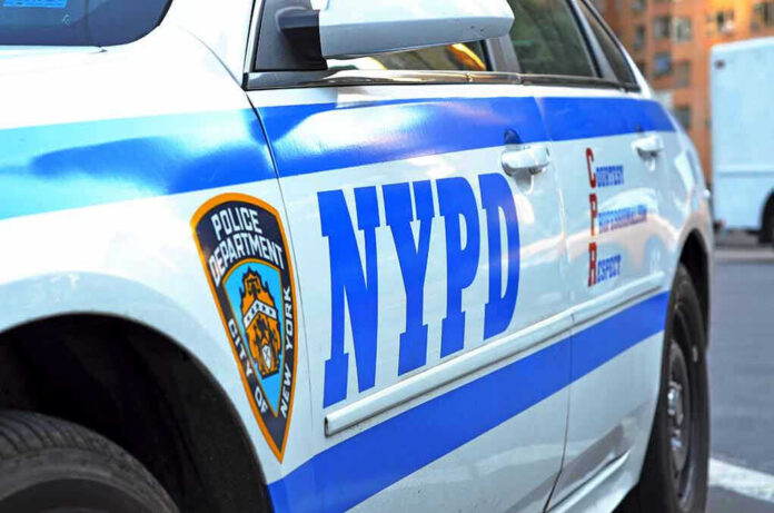 1910596186 NYPD police car with logo and text