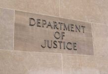Department of Justice sign on a building