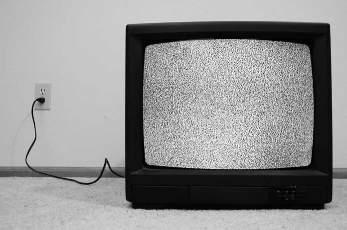 shutterstock_61425613.jpg A vintage television displaying static on the screen