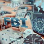 FBI text surrounded by digital security graphics and hands