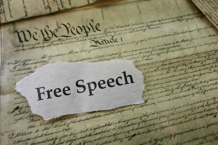 Old document with text Free Speech overlay