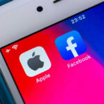 Apple and Facebook apps on smartphone screen