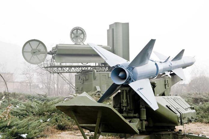 A missile system with a radar unit in a military setting