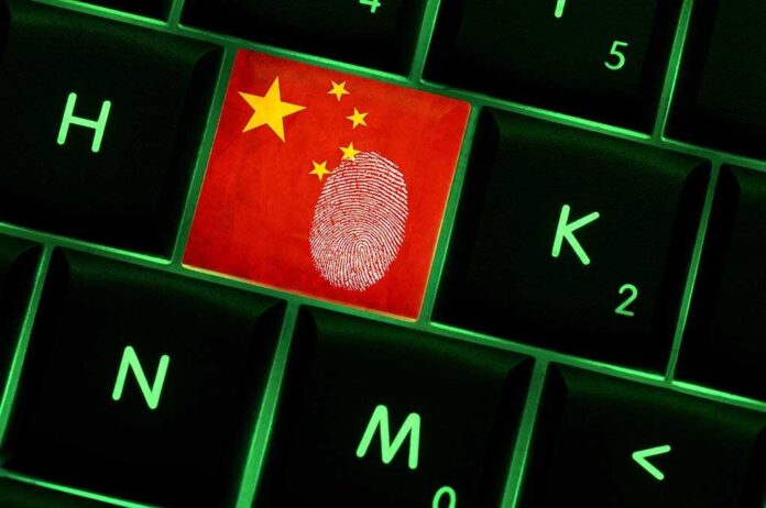 Close up of a keyboard key featuring the Chinese flag and a fingerprint
