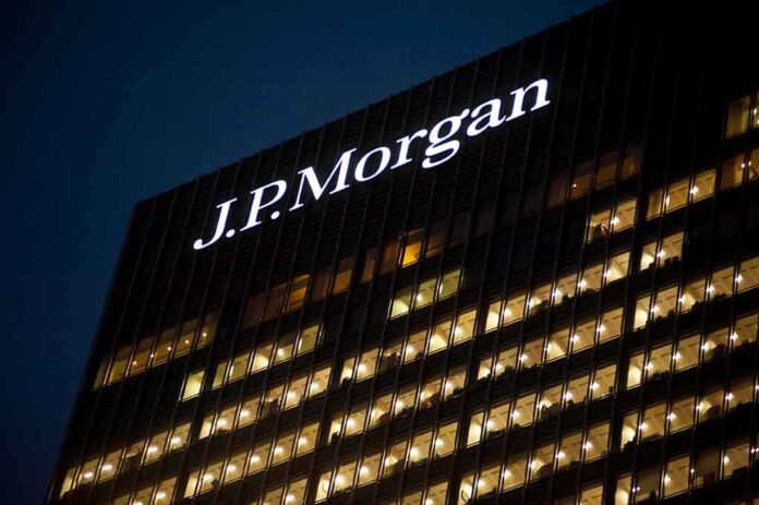 Illuminated J.P. Morgan building at night with visible office windows