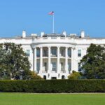 The White House with the American flag flying in front