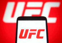 Patriotic UFC Fighter BLASTED For Epic Obama Rant UFC logo on phone screen and background.