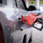 Trump RAGES at Gas Companies Over ‘Totally Illegal’ Gouging A person refueling a car at a gas station