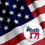 Dem Candidate Sparks Outrage – Says He Hates Christianity! American flag with a Democratic Party donkey symbol