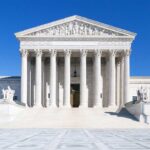 RINO SLAMMED After Supreme Court Greenlights Deportations The Supreme Court building featuring marble columns and a clear blue sky