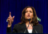 Kamala Harris Makes Pathetic Move In 2028 Desperation! Woman speaking passionately at a podium, gesturing upward.