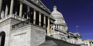 United States Capitol building with grand staircase and dome
