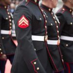 Commie Mamdani Shatters 60-Year Tradition – SABOTAGES Parade Marines in formal uniforms marching in a parade