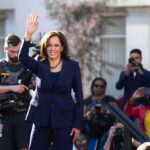 Kamala’s Endorsement Snubbed — Dem Says NO! woman in navy suit waving at outdoor event