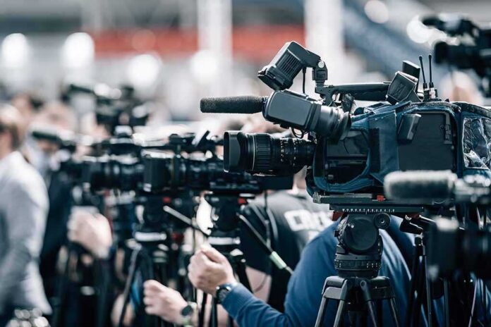 Public,Live,Event,Media,Coverage,,Television,Cameras,At,A,Press Broadcast cameras on tripods at a press event