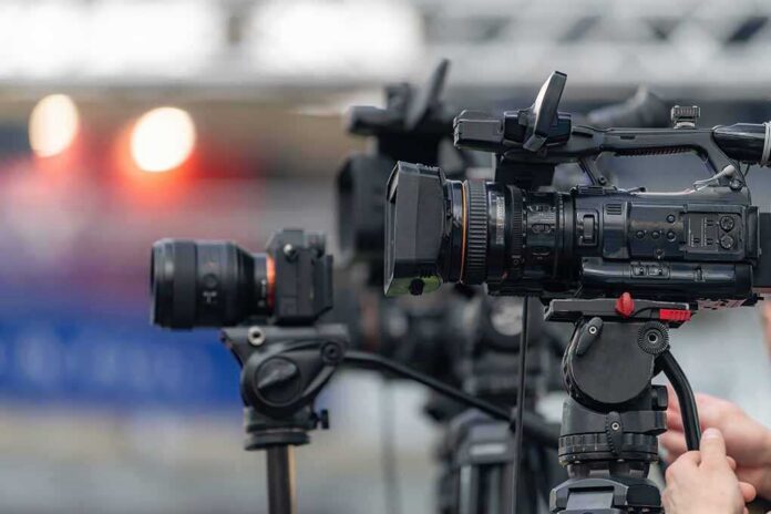 Multiple,Professional,Video,Cameras,On,Tripods,For,Event,Recording.,Multi Professional video cameras on tripods