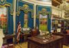 Oval Office-style desk and decor in a museum display