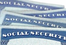Social Security cards stacked in a close-up view