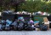 Mother Pleads Guilty – Killed Newborn in Dumpster Overflowing dumpsters with piles of trash bags and cardboard