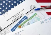 ICE Snatches Military Families During Raids immigration forms with green card and social security card on US flag background