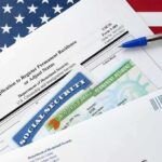 Supreme Court Greenlights Mass Expulsions immigration forms with green card and social security card on US flag background