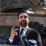 Mamdani Sides WITH Killer, Completely Ignores Victims Family Zohran Mamdani speaking at an outdoor press conference