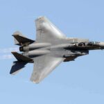 Hero Airman Reveals How He Survived Iran Crash fighter jet banking in clear sky