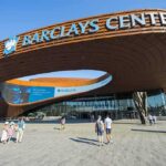 WNBA Showdown: NBA Star Flips Gender Barclays Center exterior with curved rust-colored facade