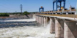 Hydroelectric dam spillway with turbulent water below