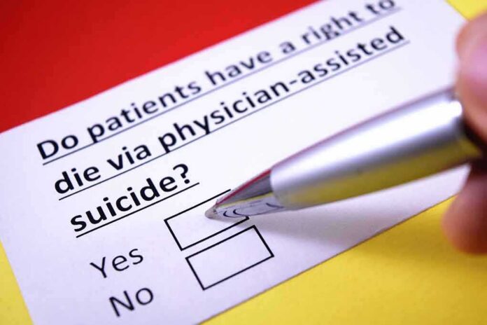 shutterstock_517142464 Hand holding pen over a yes or no checkbox on a medical ethics question