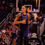 Brittney Griner running on a basketball court during a game