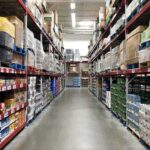 Supermarket Roof COLLAPSES – Shoppers Trapped! Warehouse aisle with tall shelves stacked with boxes and bulk goods