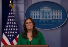 Trump Aide Files RESTRAINING Order Against GOP Rep woman speaking at a White House press briefing podium