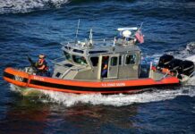 Midnight Flight Jet Vanishes Off U.S Coast U.S. Coast Guard patrol boat speeding on open water