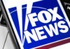 Trump Crashes Fox News Stars’ Surprise Wedding Fox News logo displayed on a smartphone screen