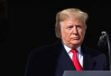 Trump RAGES at Secret Service Agents – Get Your A** in the Car Donald Trump at a podium with a microphone